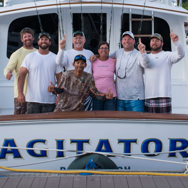 agitator team on back of fishing boat