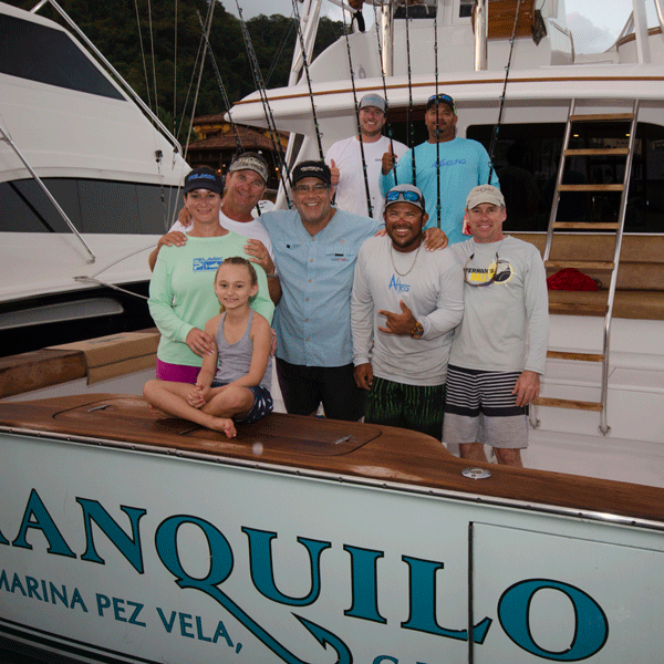 Team Tranquilo on the back of the boat