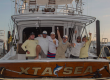 team xta sea on back of boat